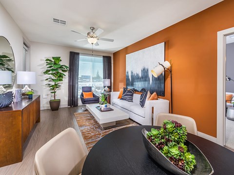 a living room with a couch and a table